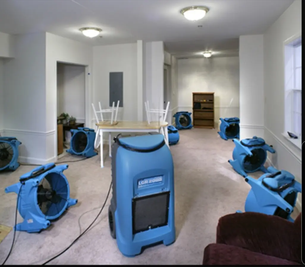 Air movers and dehumidifier setup for Water Damage Restoration in Union